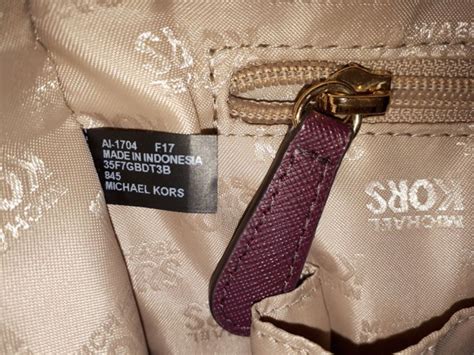 check michael kors bag serial number